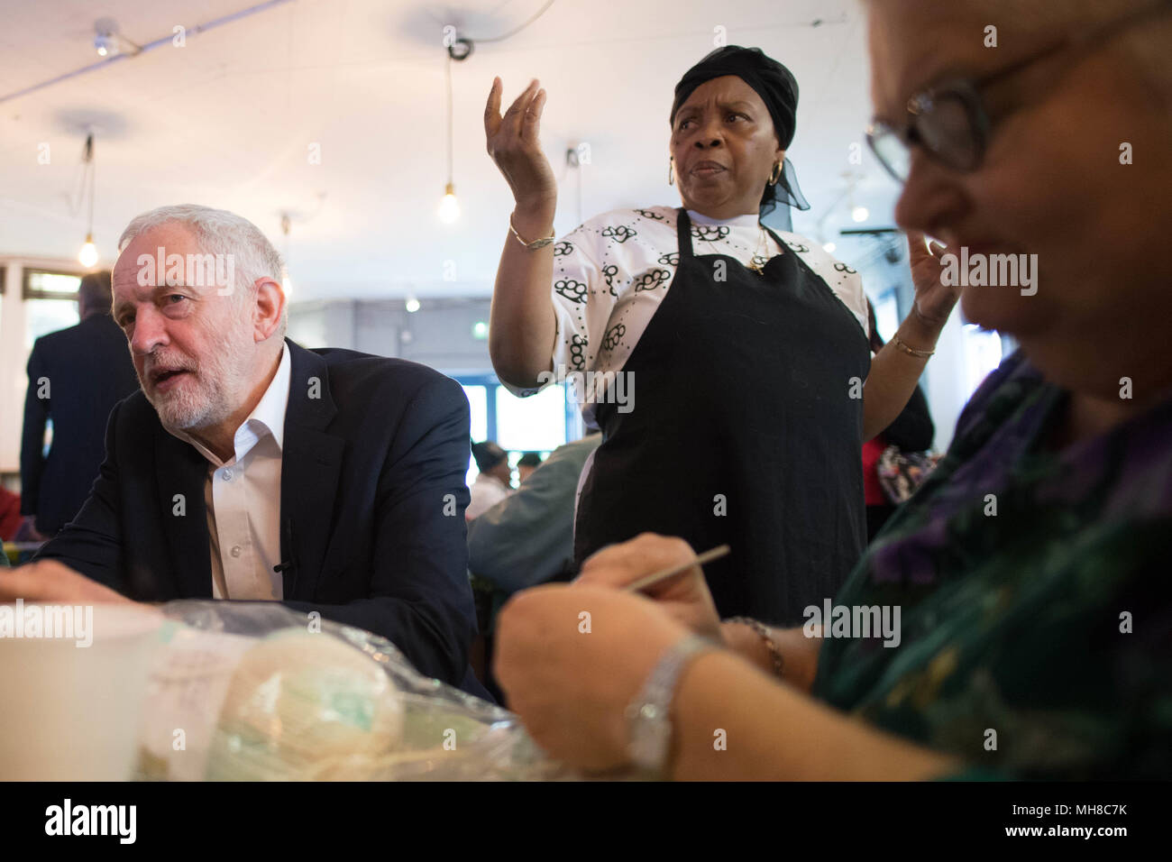 Labour leader Jeremy Corbyn meets people from the Caribbean and the West Indies, members of the Stockwell Good Neighbours community group, at the Oval House Theatre in Kennington, south London. Stock Photo