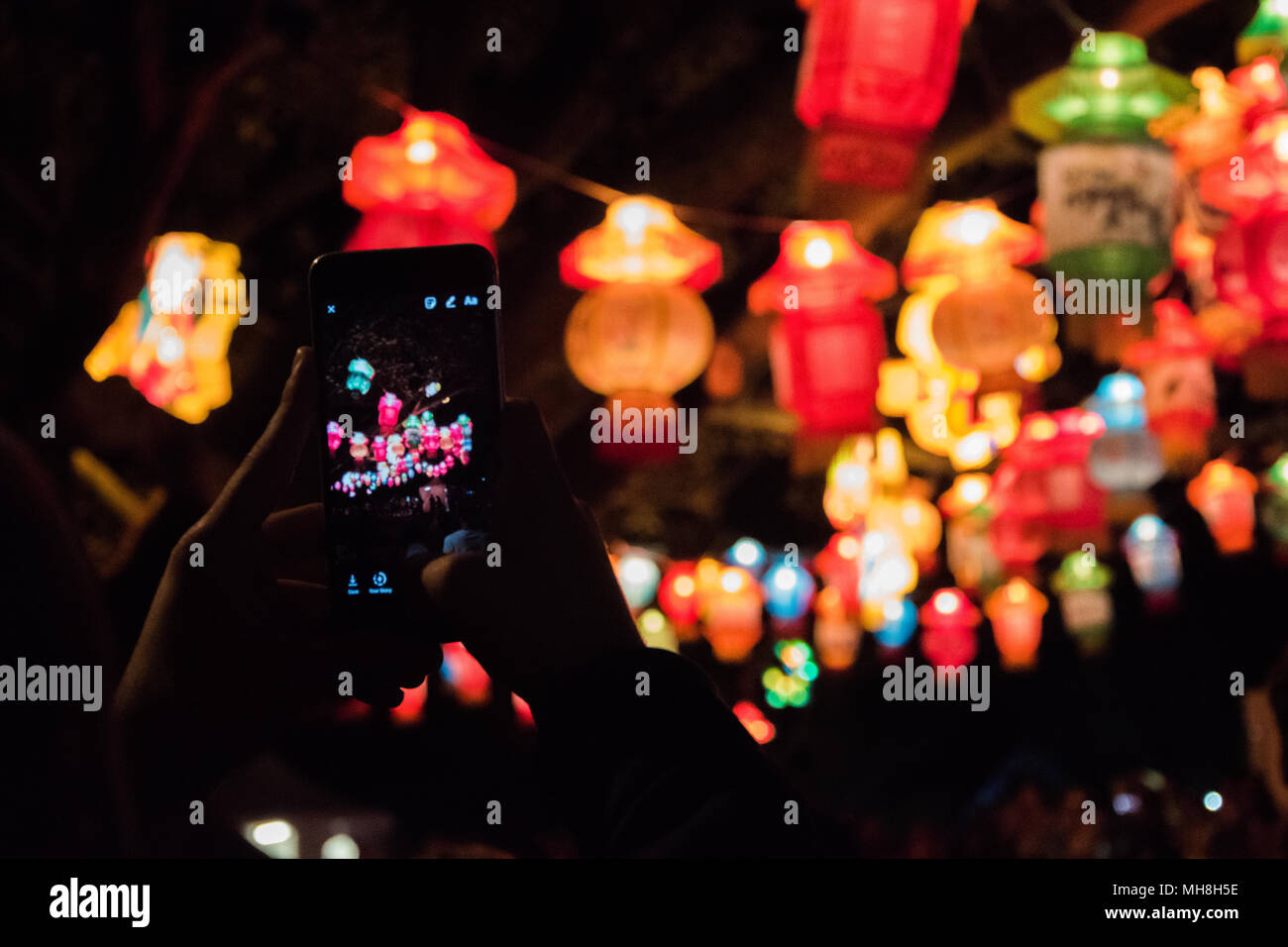 Taking a photo of lanterns at night Stock Photo