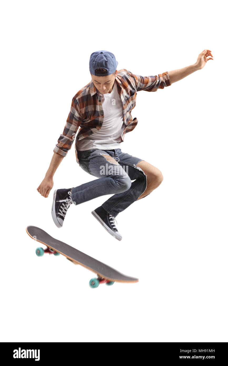Teenage skater boy jumping isolated on white background Stock Photo