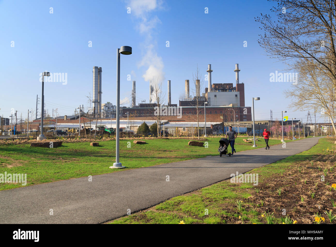 Schuylkill Banks Recreation Path in revitalized industrial area with Veolia Thermal Energy Plant, Philadelphia , Pennsylvania, USA Stock Photo