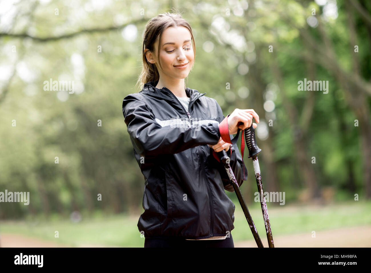 Walking park woman hi-res stock photography and images - Alamy