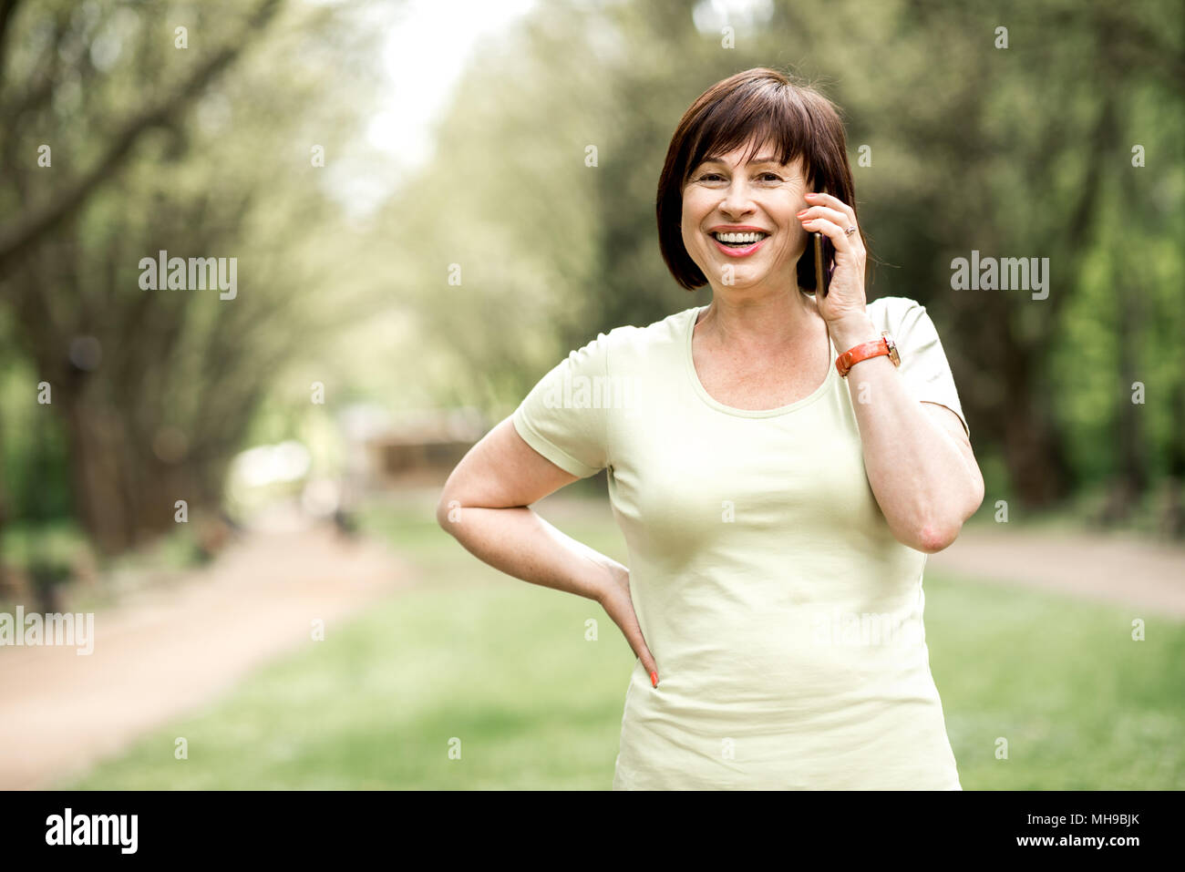 Happy older woman outdoor hi-res stock photography and images - Alamy