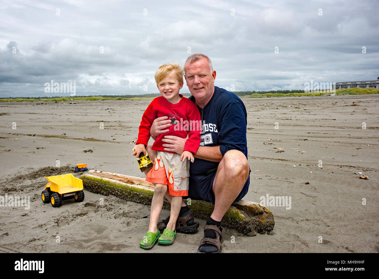 Family enjoying some relaxing vacation time on the beautiful beach of Ocean Shores, Washington, U.S.A. Stock Photo
