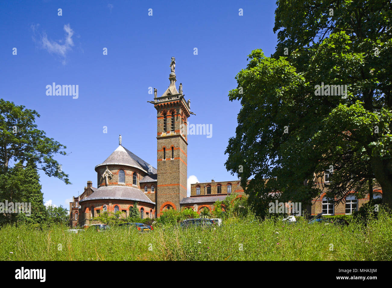 View towards historic development across garden. St Josephs College, Mill Hill, United