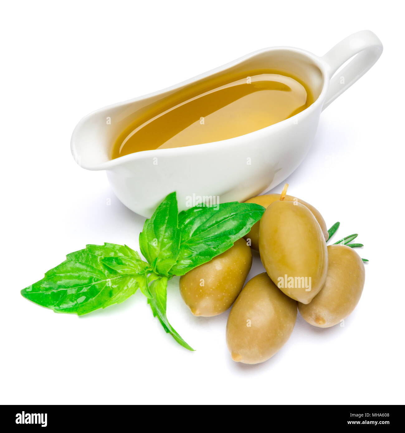 green olives ond olive oil isolated on white background Stock Photo - Alamy