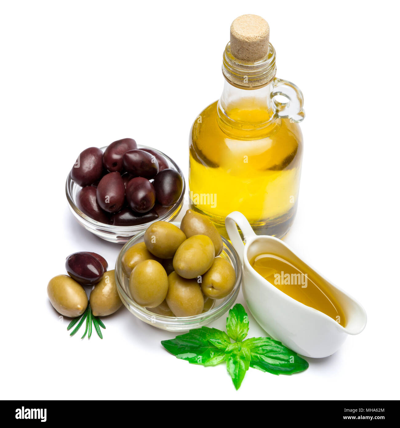 green olives ond olive oil isolated on white background Stock Photo - Alamy