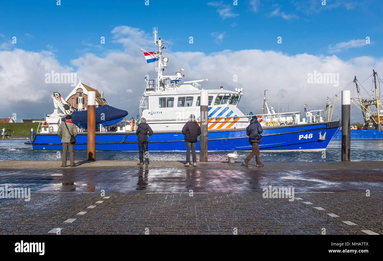 Dutch police boat in the port of Oudeschild on the Dutch island of Texel Stock Photo