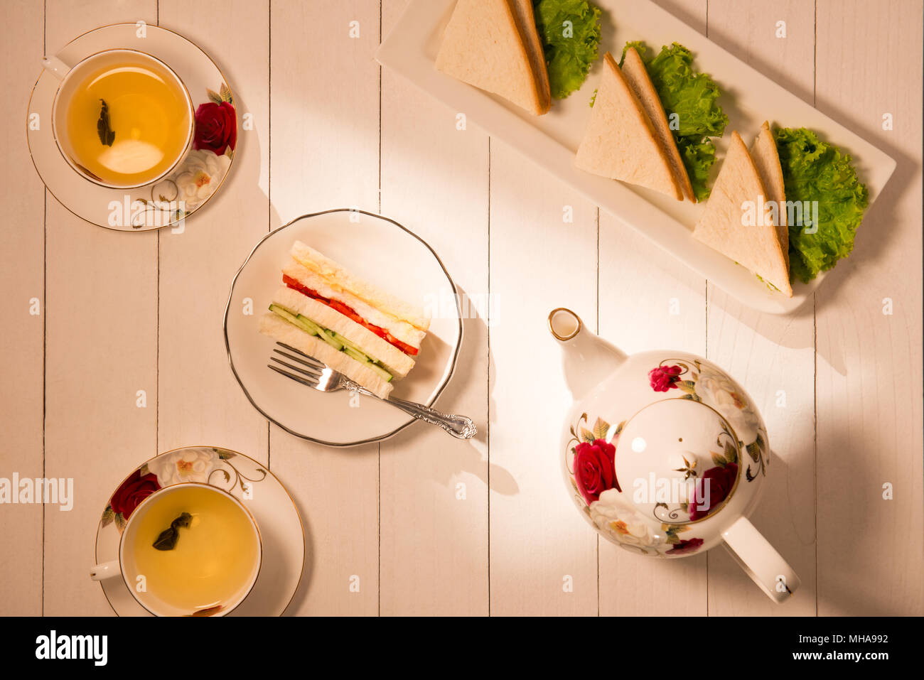 Afternoon tea table. tea set with sandwiches Stock Photo Alamy