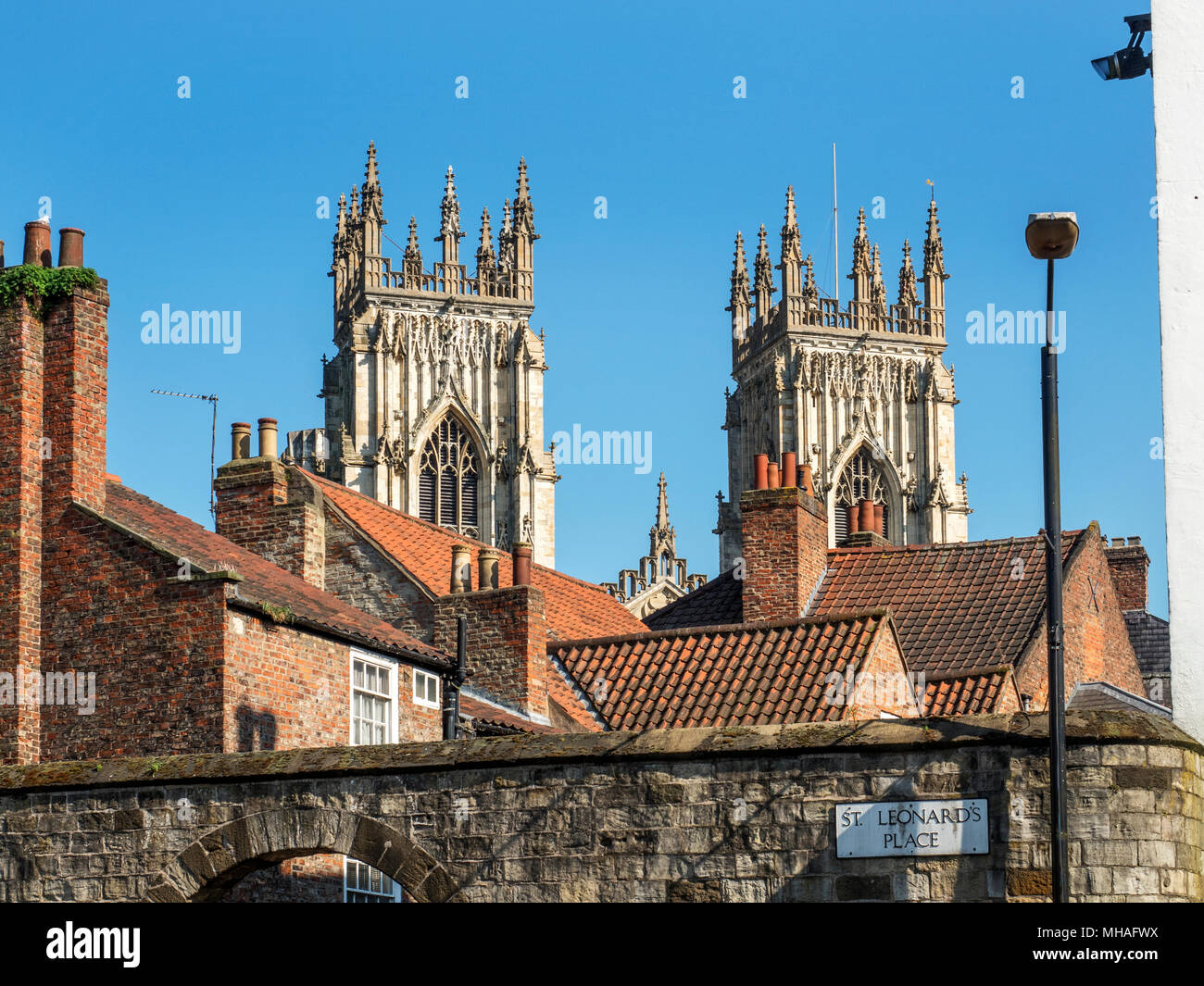 Towers of York Minster from St Leonards Place York Yorkshire England Stock Photo