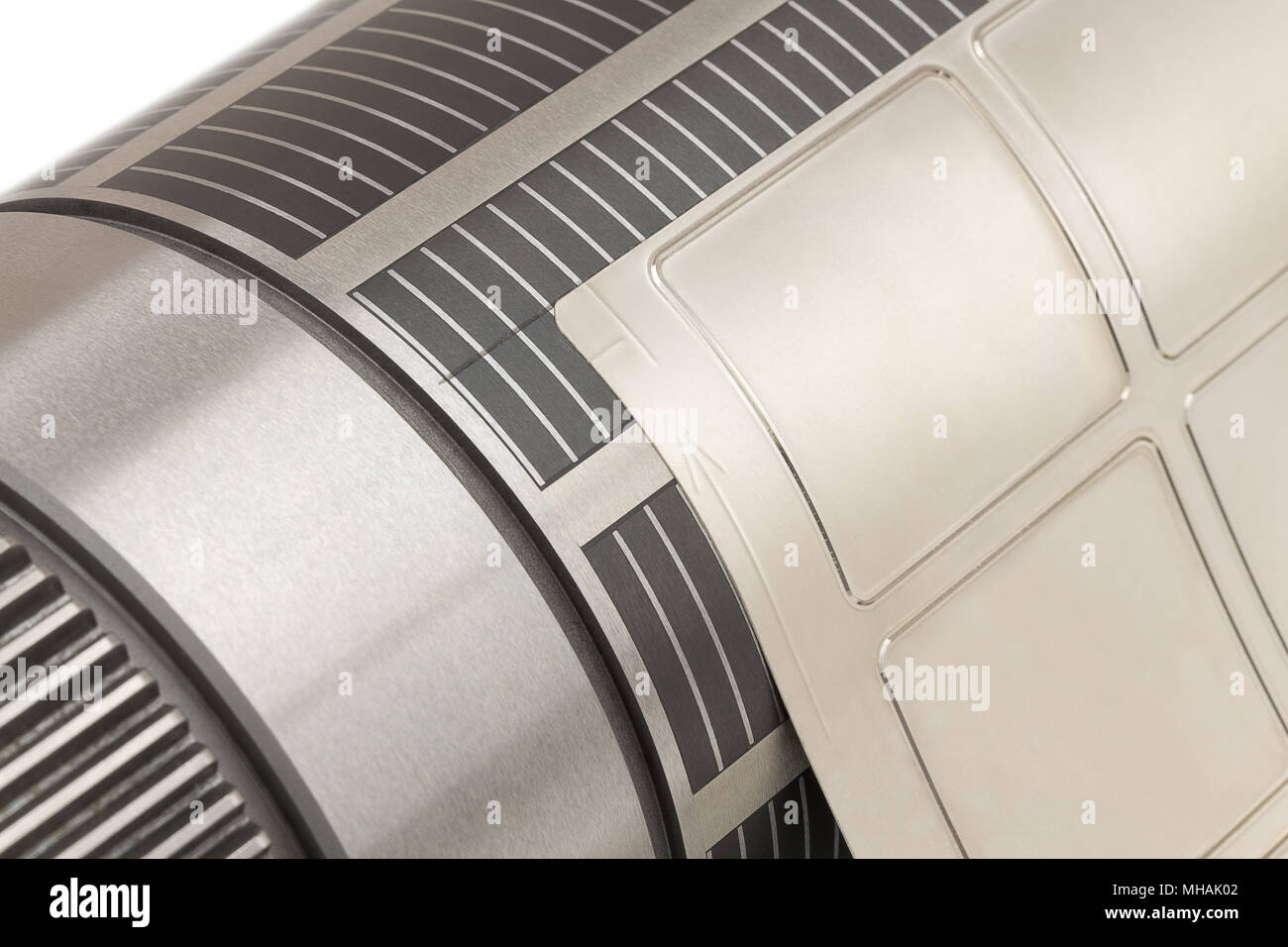 cylinder with attached flexible die for die cutting on rotary printing press.