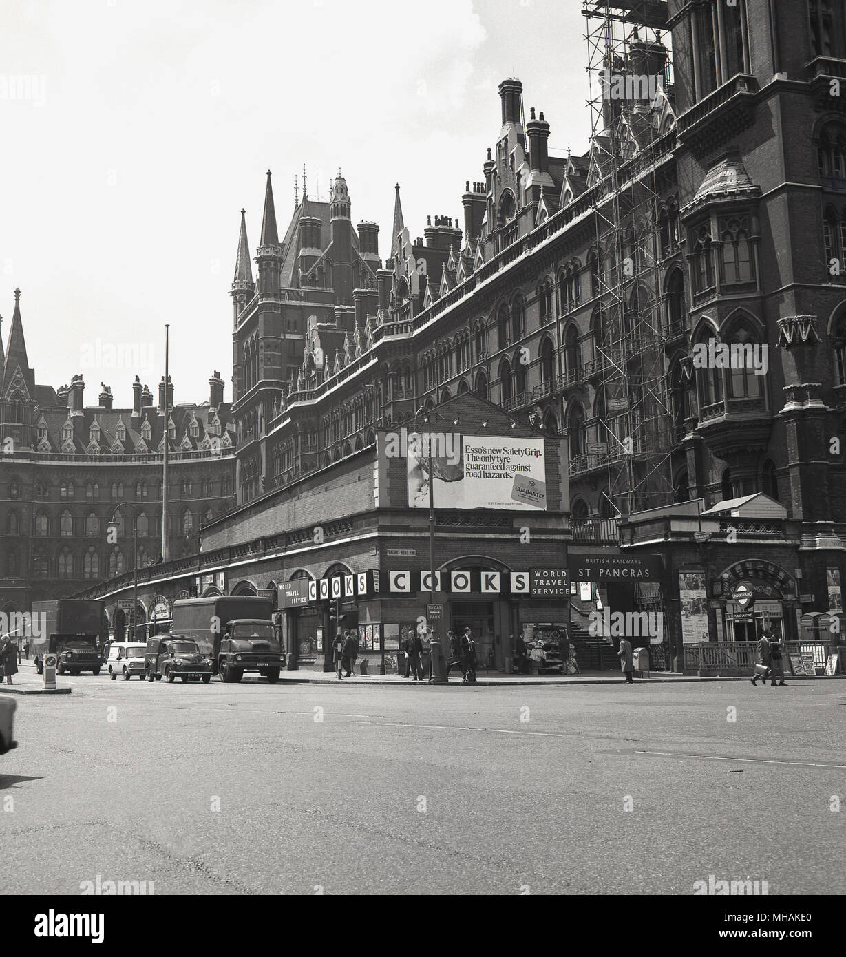 1958, historical, exterior view of St Pancras railway station and the former Midland Grand Hotel, Euston Rd, London, England, UK, designed in Victorian Gothic style by George Gilbert Scott. The hotel closed in 1935 and after surviving the blitz in WW2, in 1948 the building was occupied by British Rail and became the headquarters for their hotels and catering arm, British Transport Hotels (BTH). Stock Photo