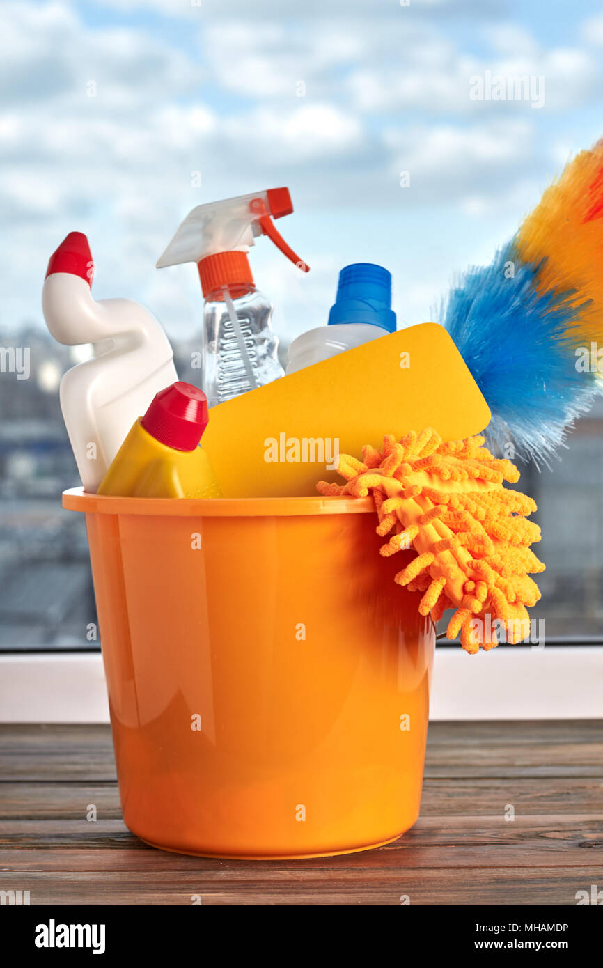 Yellow bucket with cleaning products Stock Photo Alamy