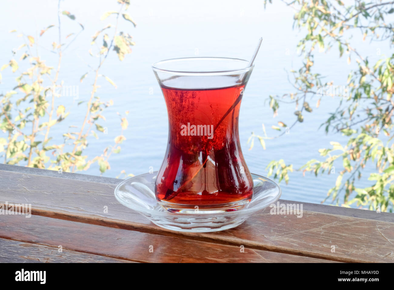 Drinking tea against the sea Stock Photo - Alamy