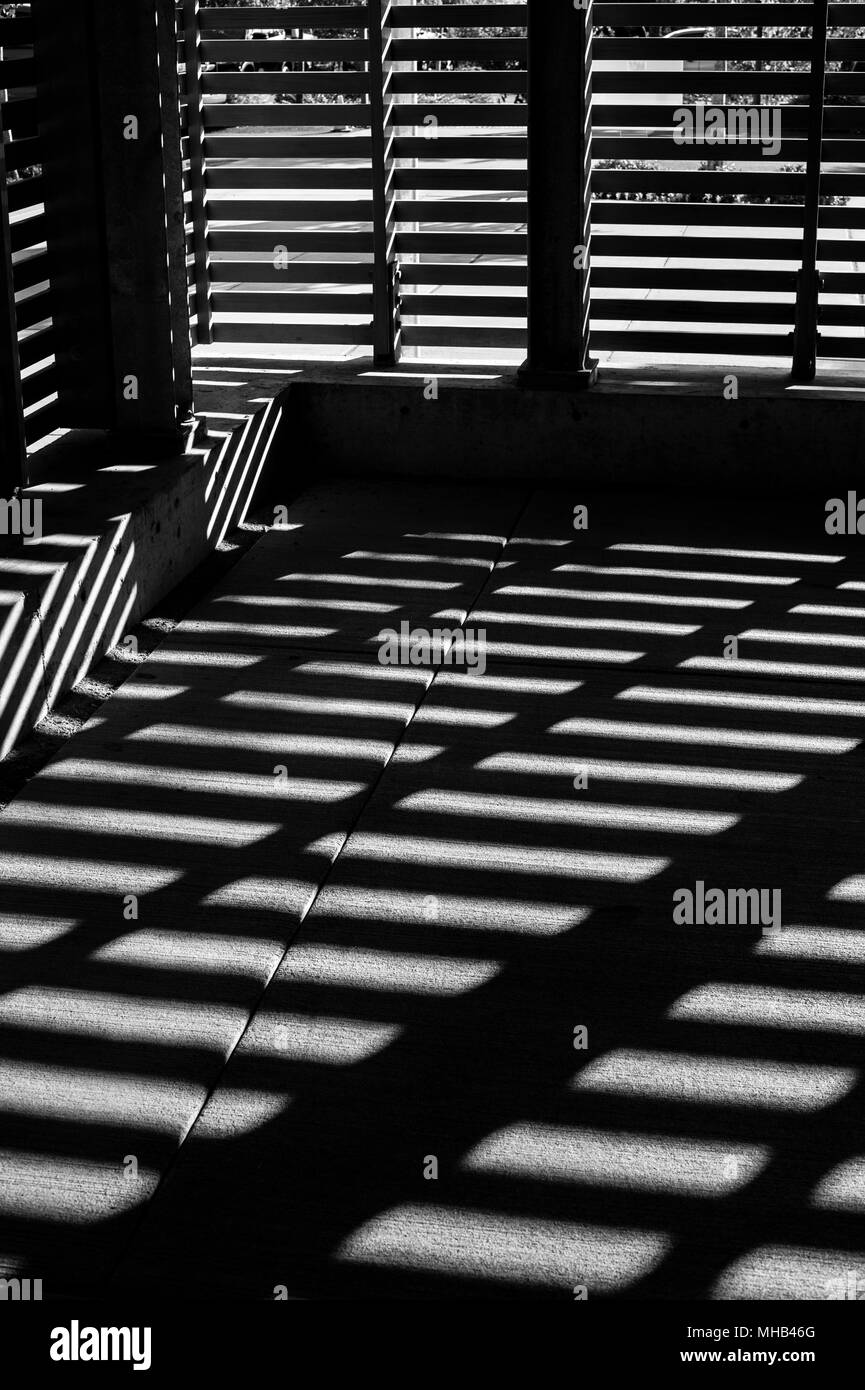 Storage room interior with light patterns creating geometric shapes