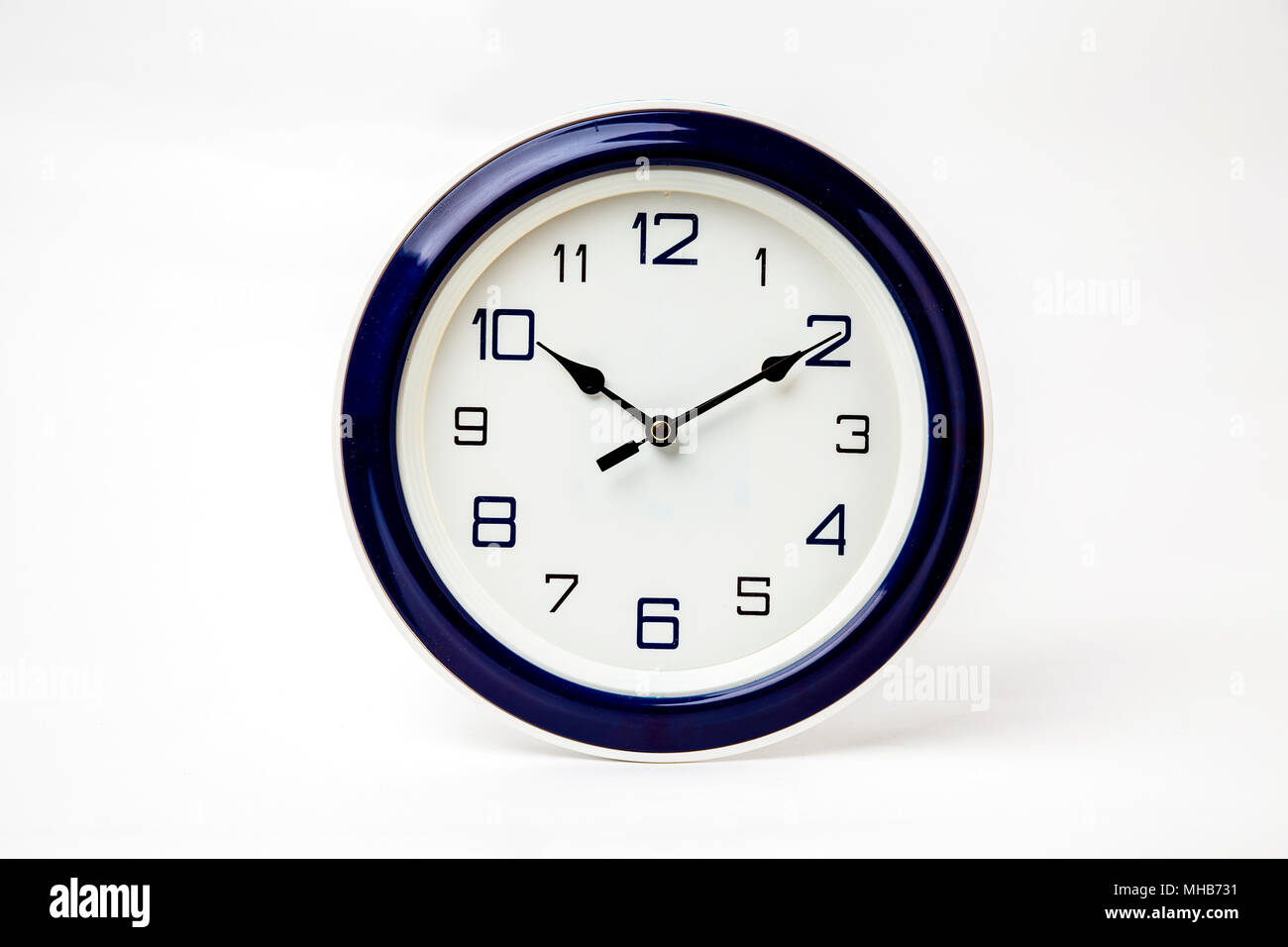 Clock in white background Stock Photo