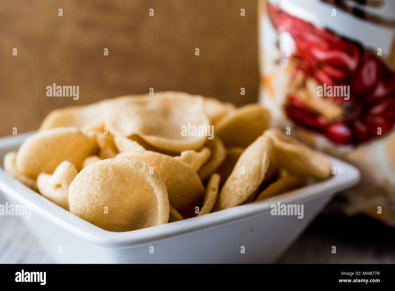 Prawn Crackers or Shrimp Chips in ceramic bowl. Seafood Appetizer Stock