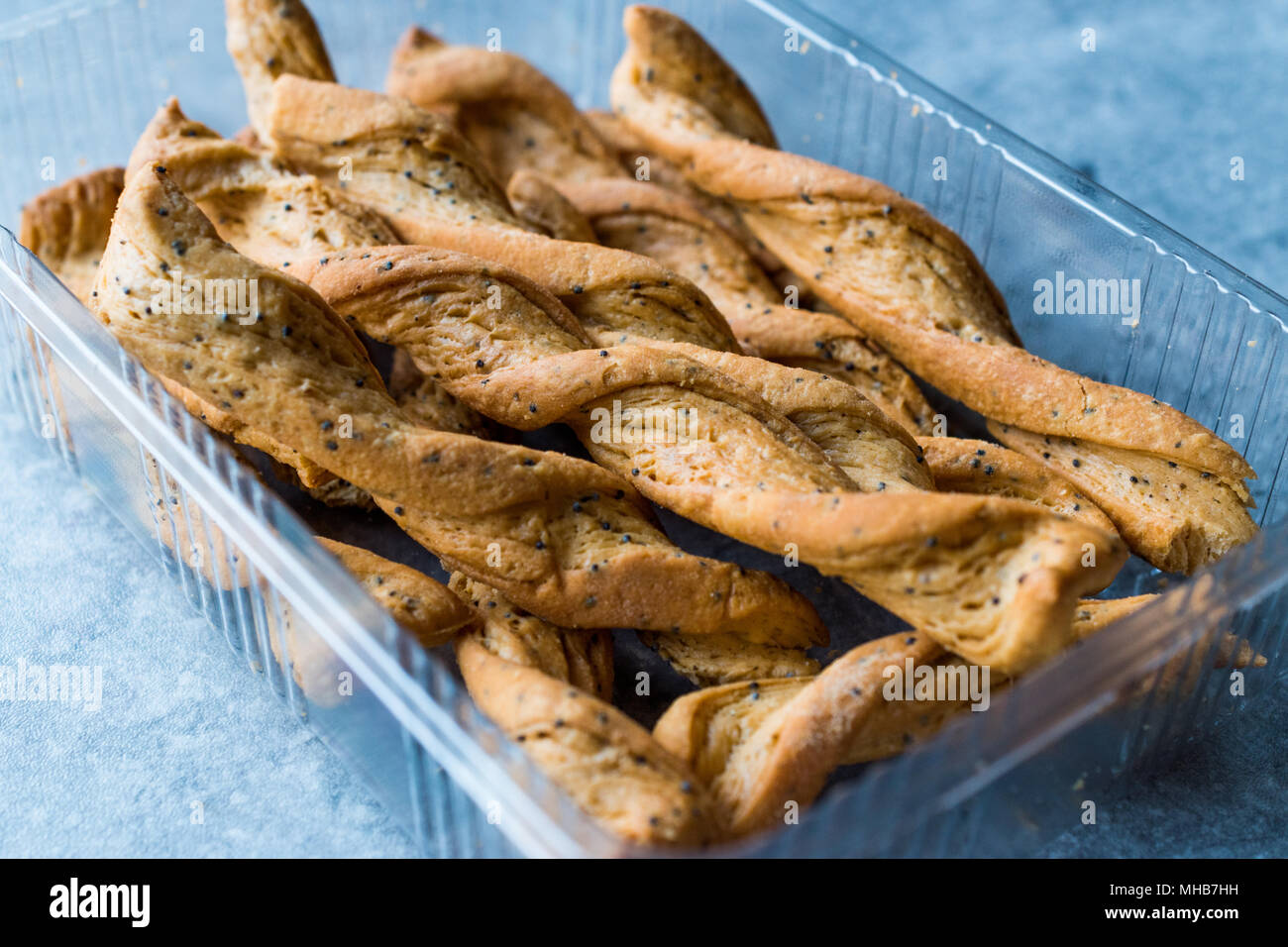 Mille Feuille Twisted Bread Stick Crackers with Spices, Tomato Flavor and Black Sesame or Cumins. Organic Food. Stock Photo