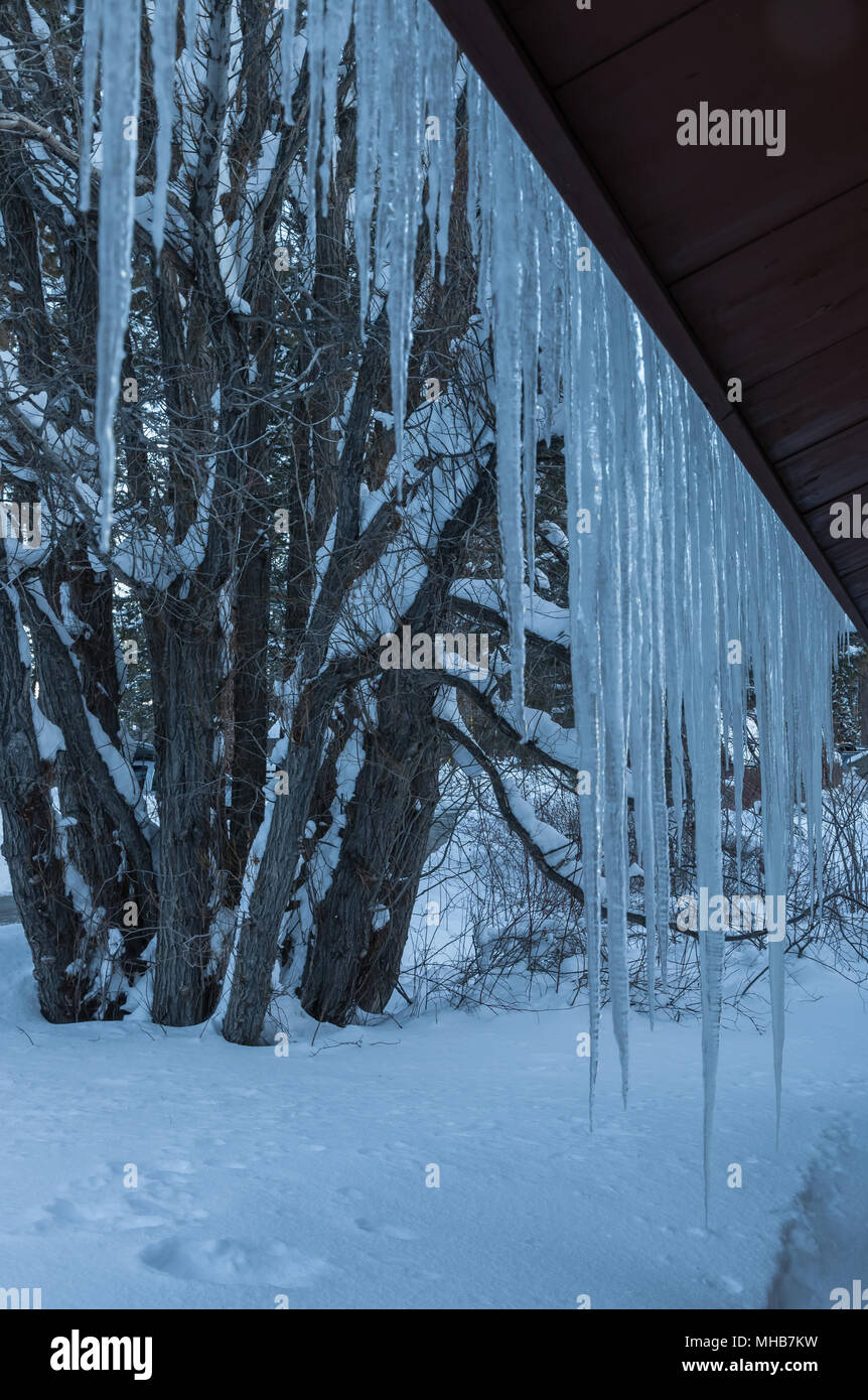 Icicles formed on a house roof during winter in Lake Tahoe, Nevada ...