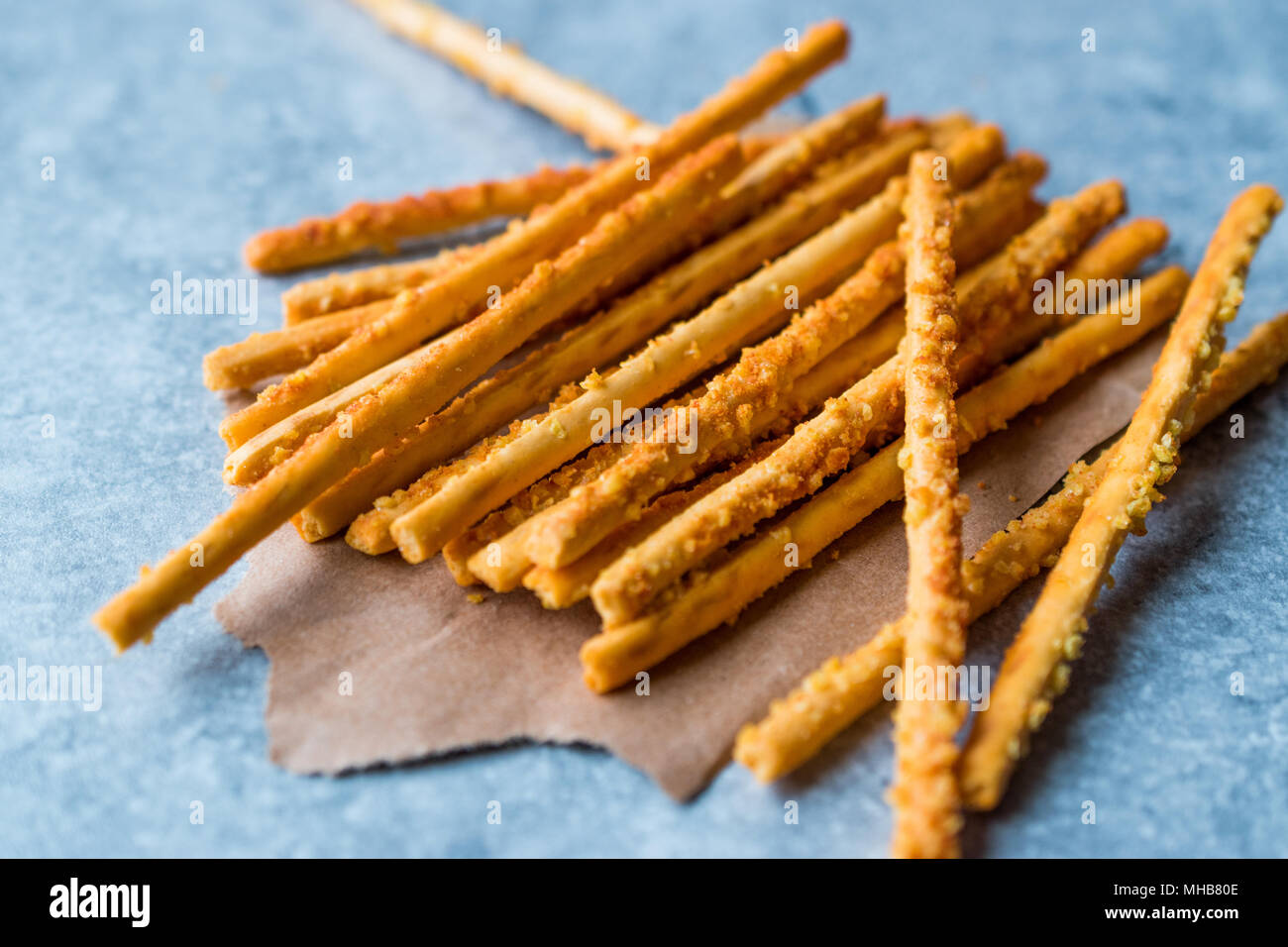 Salty Pretzel Crunchy Sticks on Blue Surface. fast Food Stock Photo Alamy