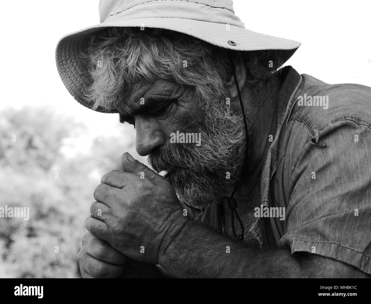 Portrait of Turkish Nomad Lighting a Cigarette Stock Photo