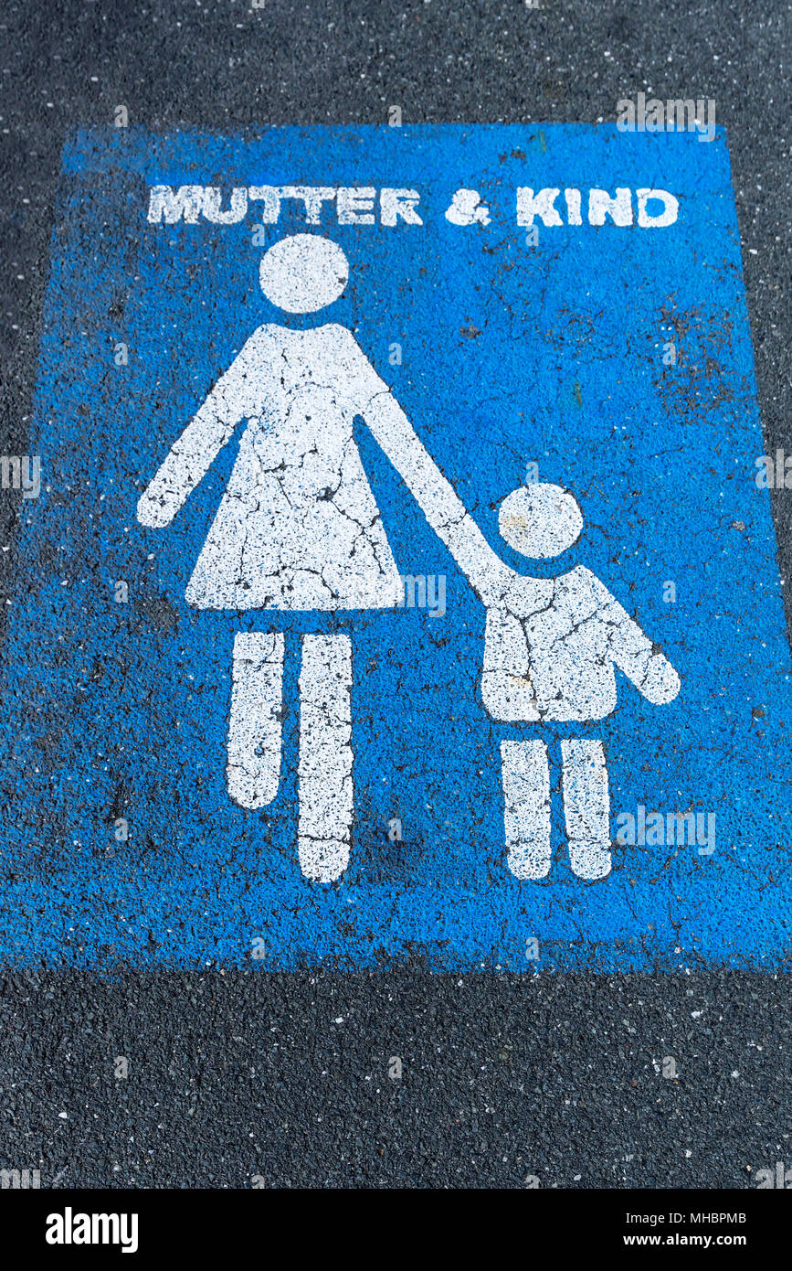 Marking on tar, parking lot for mother and child, Bavaria, Germany Stock Photo