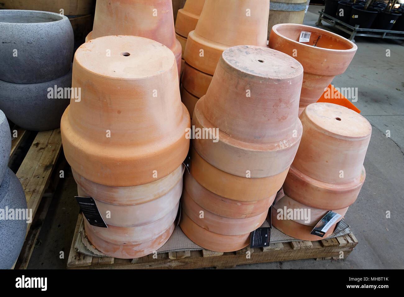 Stack of Terracotta pots on display Stock Photo