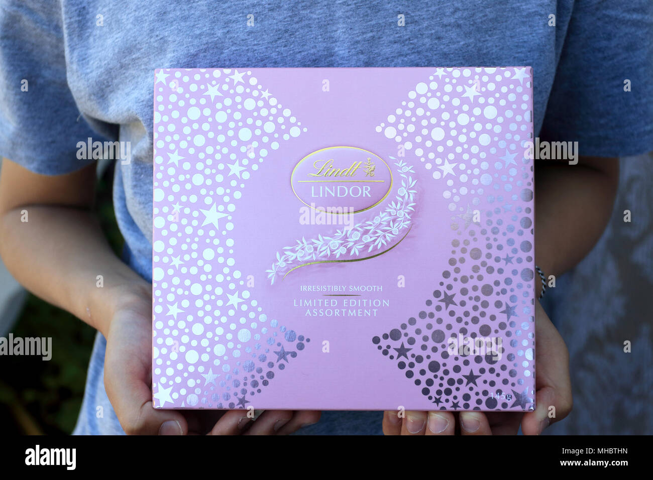 Close up of Limited Edition Lindt Lindor Chocolates in pink colour box Stock Photo