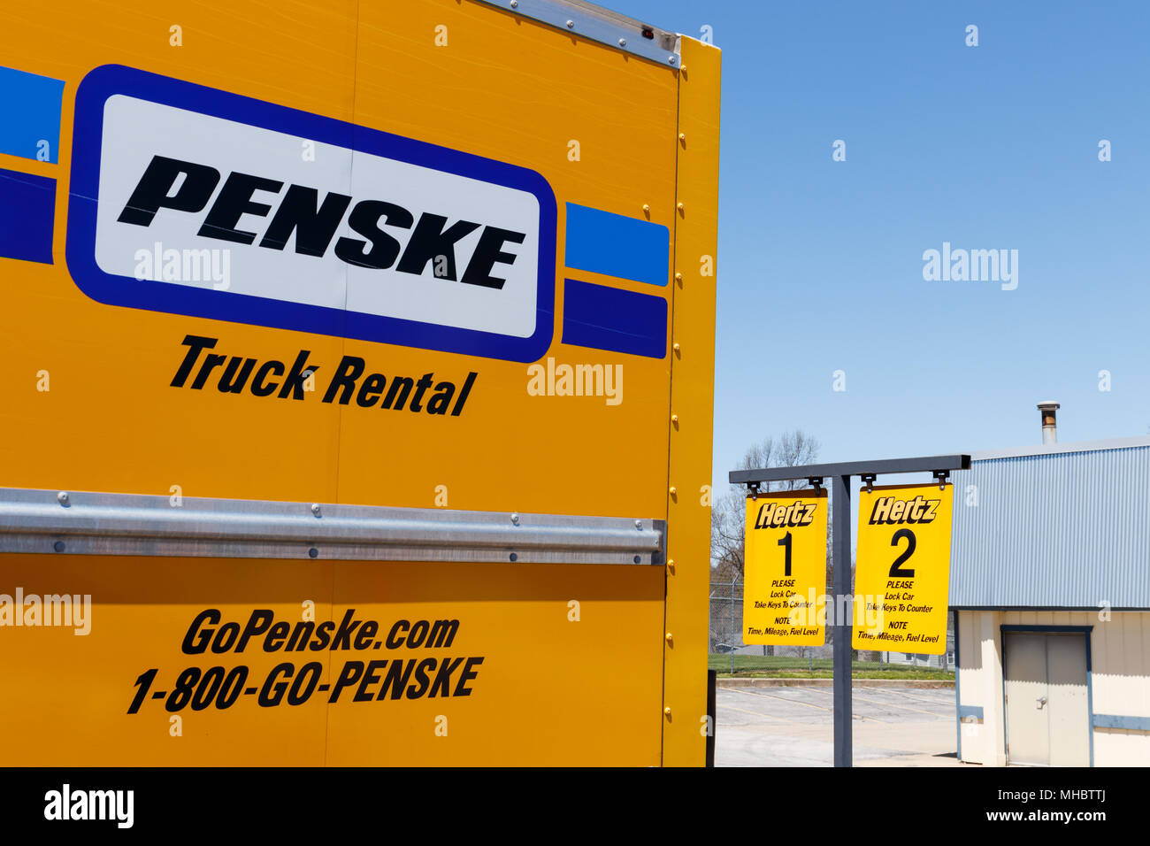 Lafayette - Circa April 2018: Local Hertz Car Rental Location renting a Penske truck. Hertz is the largest U.S. car rental company by sales II Stock Photo