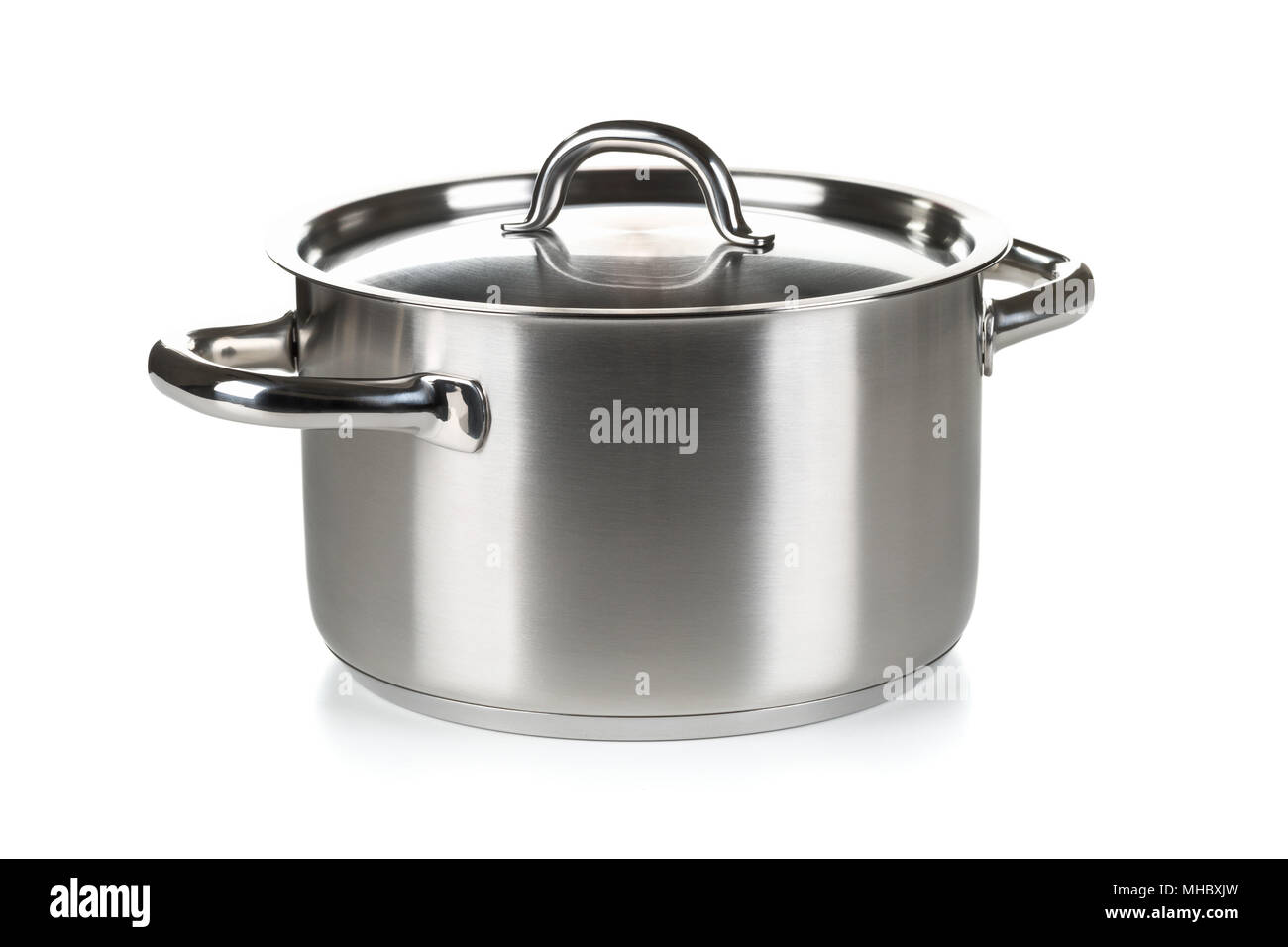 Open stainless steel cooking pot with lid over white background Stock Photo Alamy