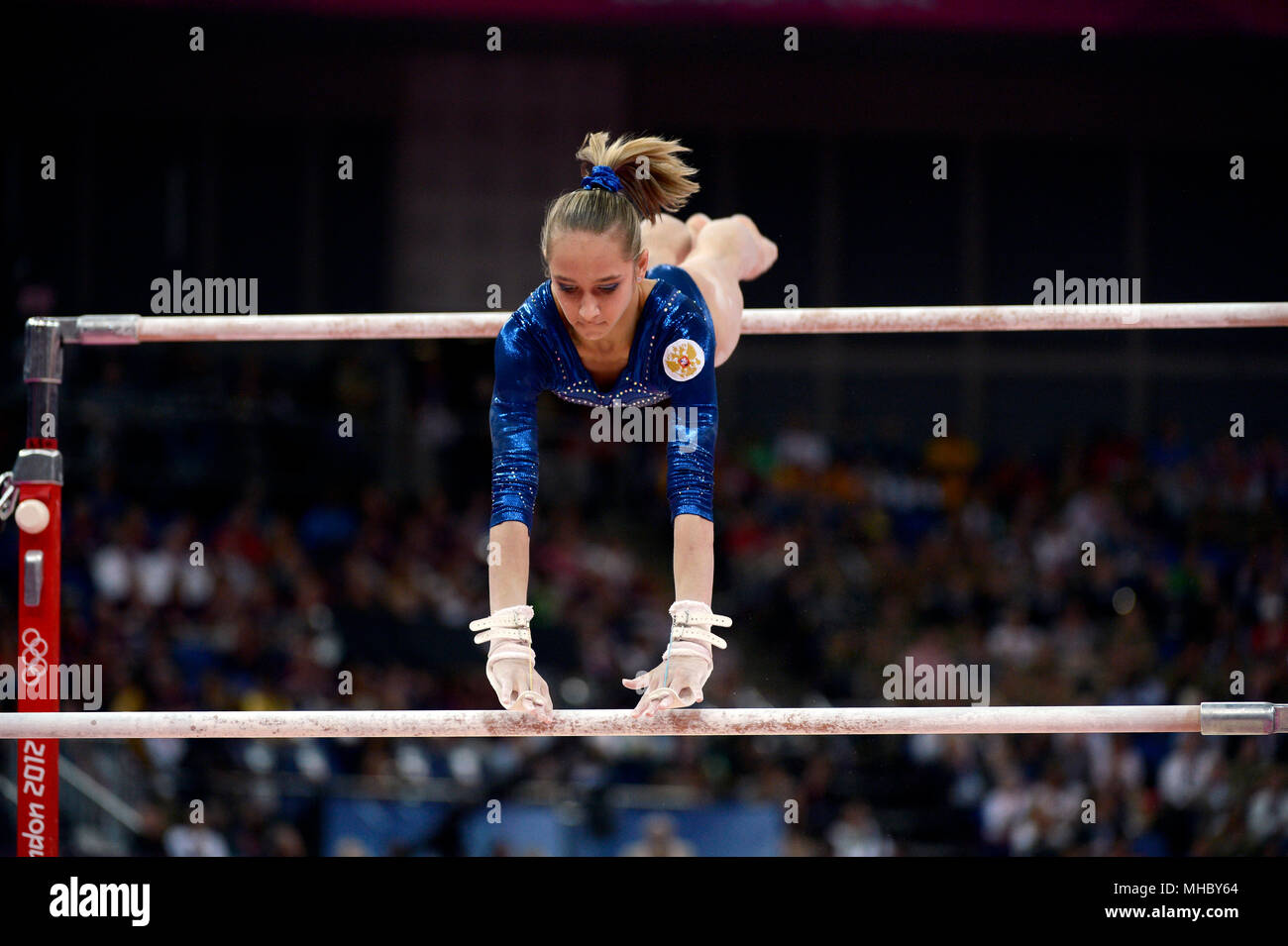 Victoria Komova of Russia performs on the Uneven Parallel Bars during