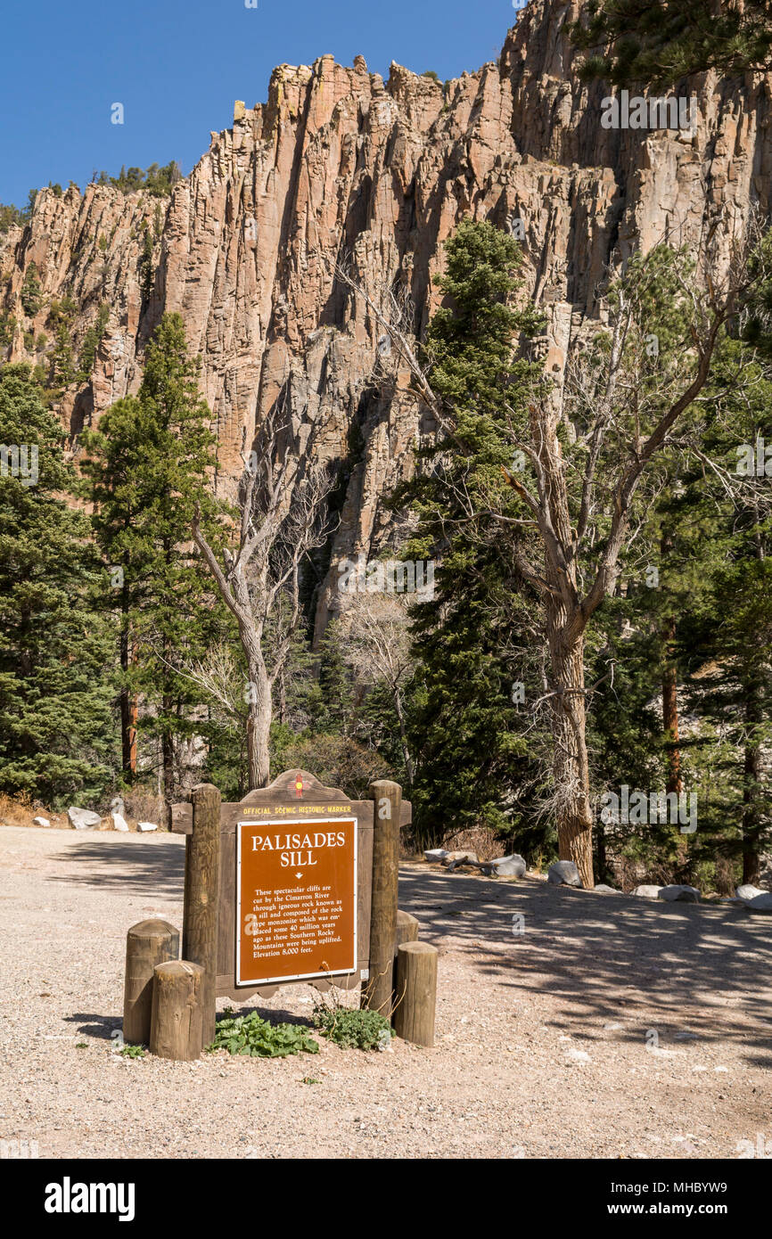 Palisades Sill sign, cliffs cut by Cimarron River in igneous rock, Cimarron Canyon State Park, near Eagle Nest, New Mexico, USA Stock Photo