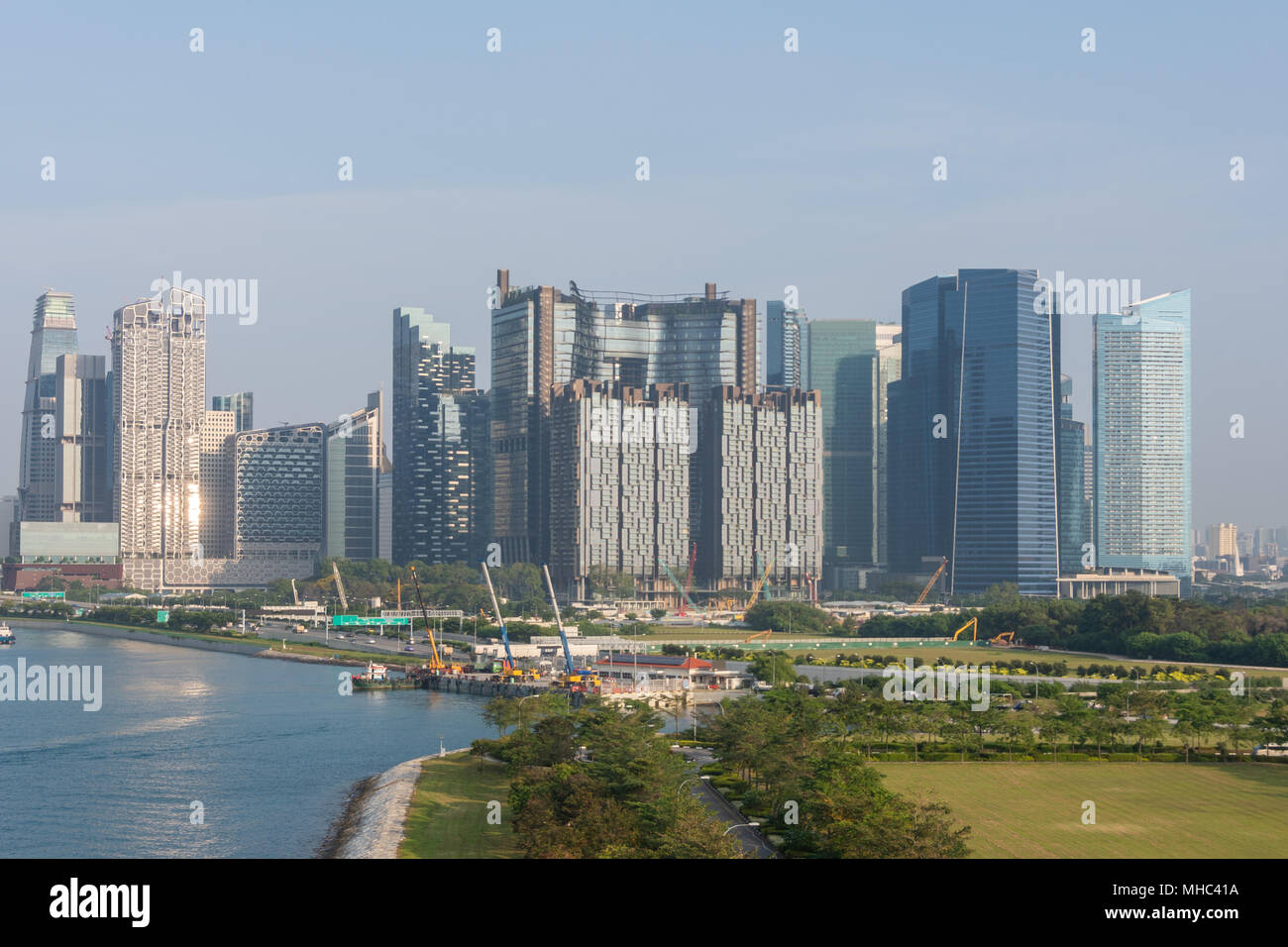 Harbor boats and panoramic view of singapore city Stock Photo