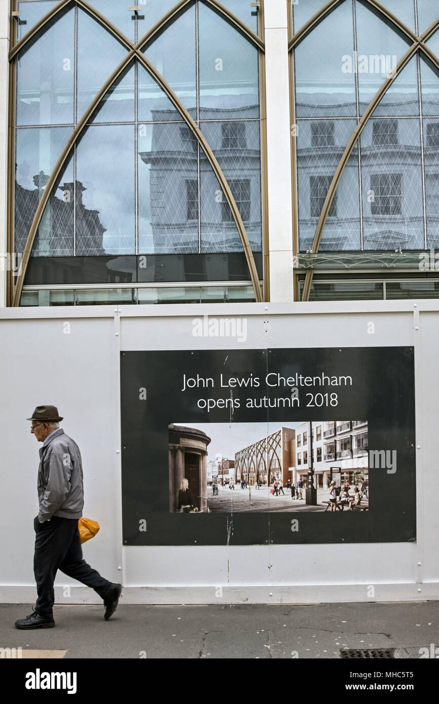 Pedestrian walking past the new John Lewis department store development