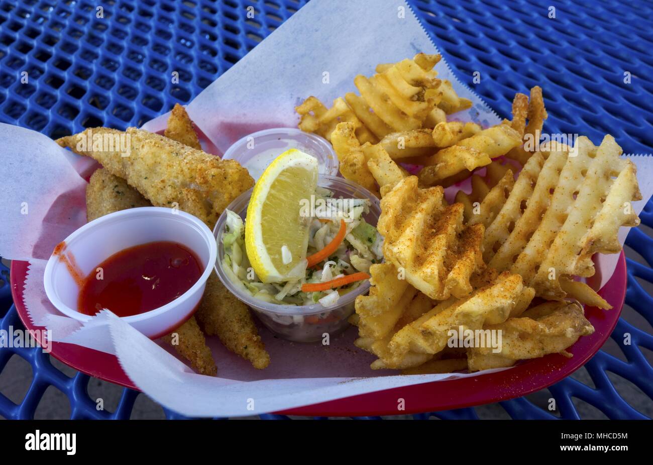 Fish and Chips Dinner Picnic Plate Close Up at Oceanside Pier Outdoors Bistro Restaurant in Southern California Stock Photo