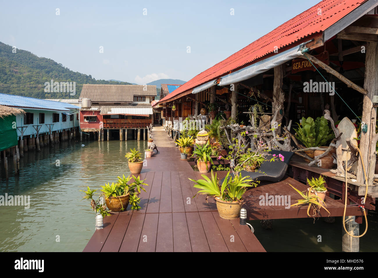KOH CHANG, THAILAND - 26 MAR, 2015: Houses on stilts in the fishing village of Bang Bao, Koh Chang, Thailand Stock Photo