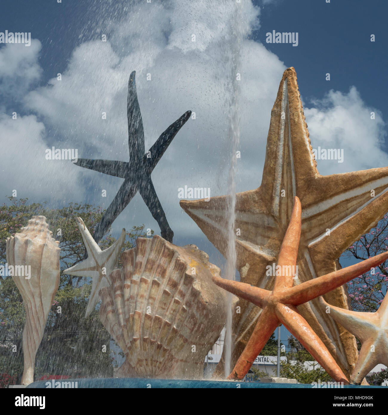 Downtown Cancun has a central fountain with gigantic seashells and
