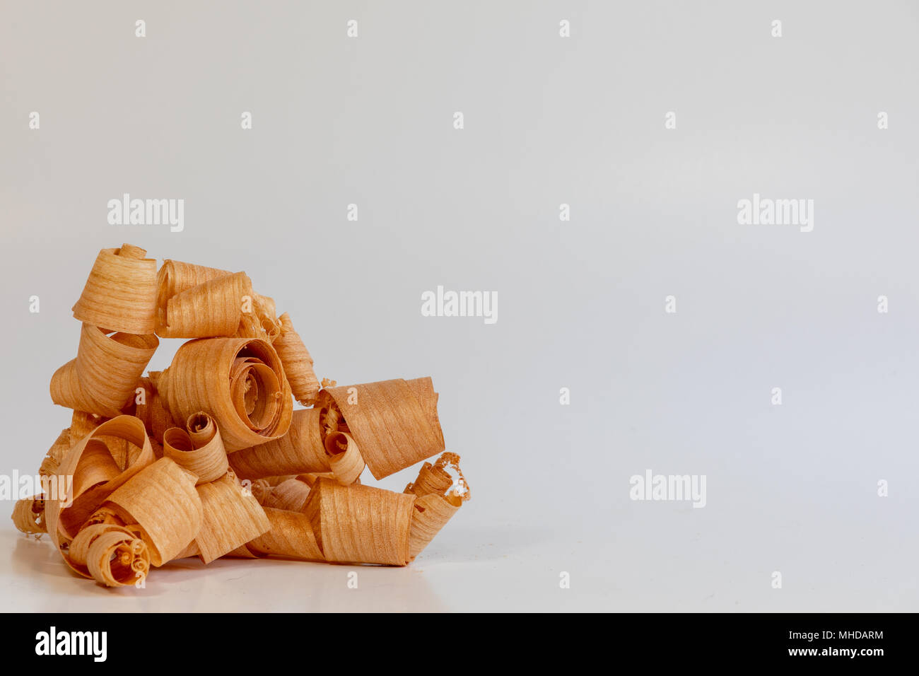 Wood shavings on white background Stock Photo