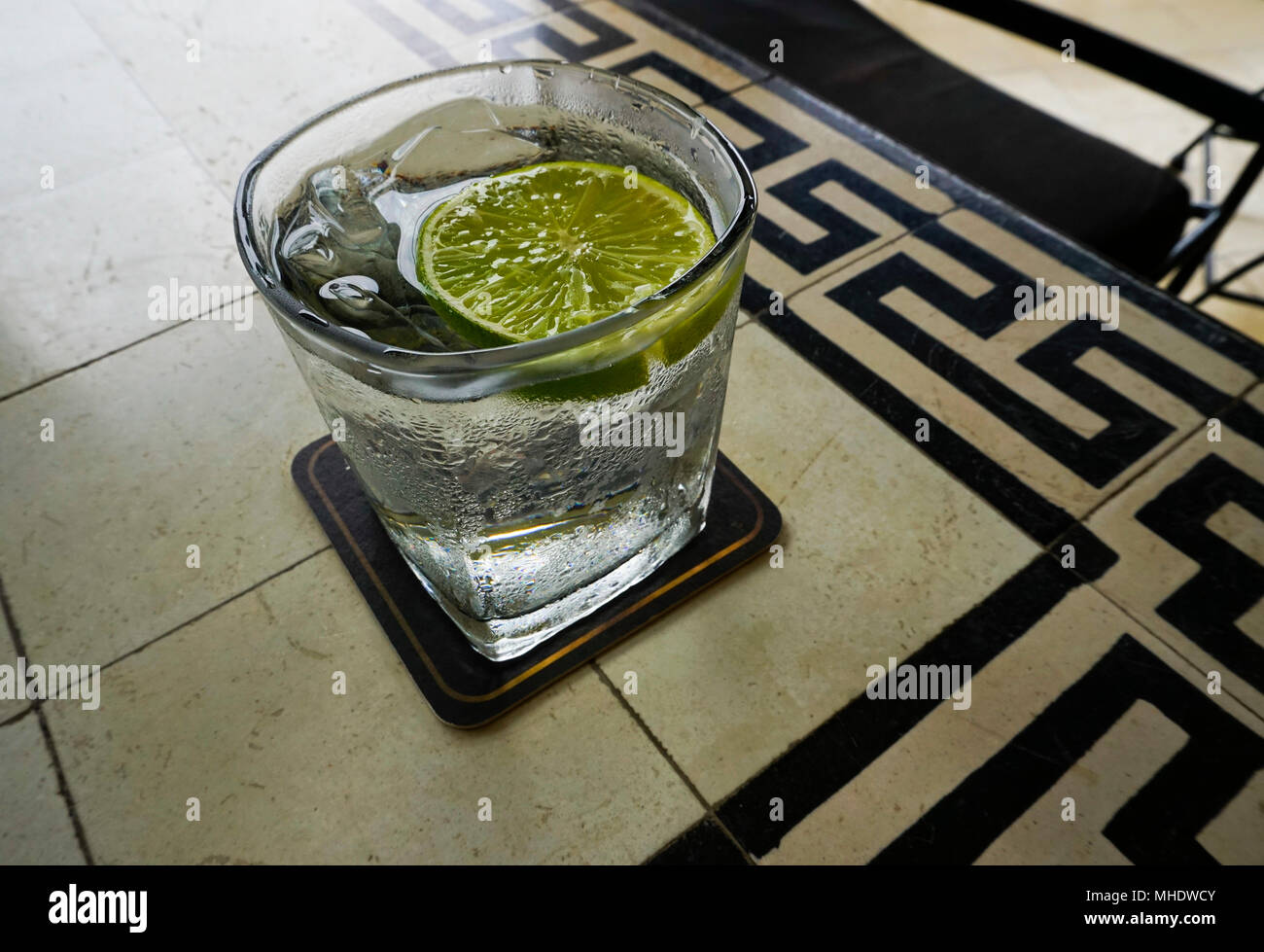Cocktail at the The Foreign Correspondents' Club in Phnom Penh, capital of Cambodia, Phnom Penh city, Cambodia. Fresh lime and club soda. Stock Photo
