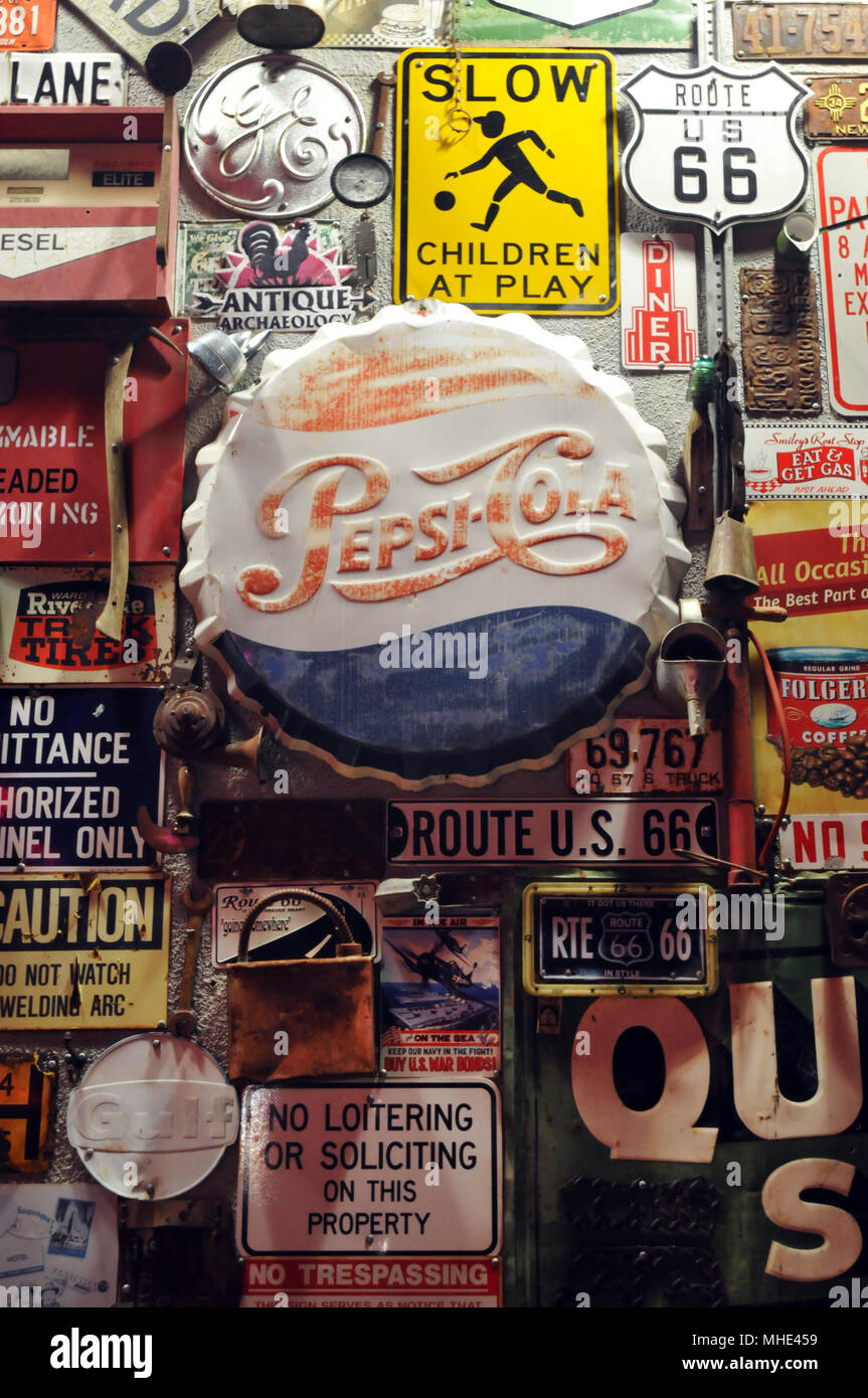 A display of vintage advertising and road signs outside the 66 Diner on Route 66 in Albuquerque, New Mexico. Stock Photo