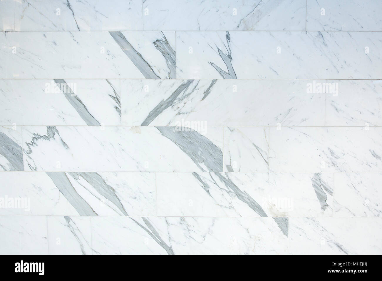 white marble textued floor tile with gray acent markings Stock Photo