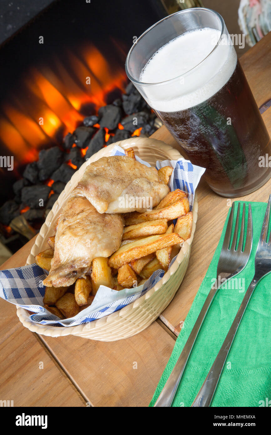 A classic English dish of Roast Chicken and chips in a basket Stock Photo -  Alamy