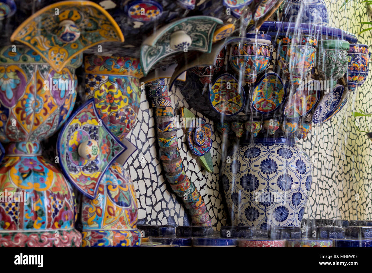 Mexican talavera style pottery used in altar and fountain. This