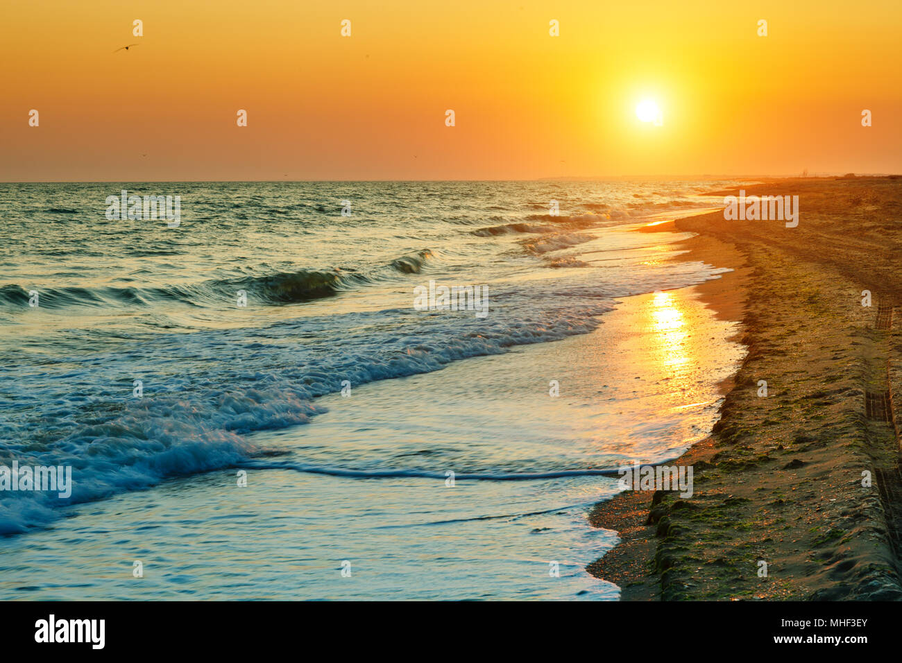 Beautiful sunset at sea. Sea background. Travel Stock Photo - Alamy