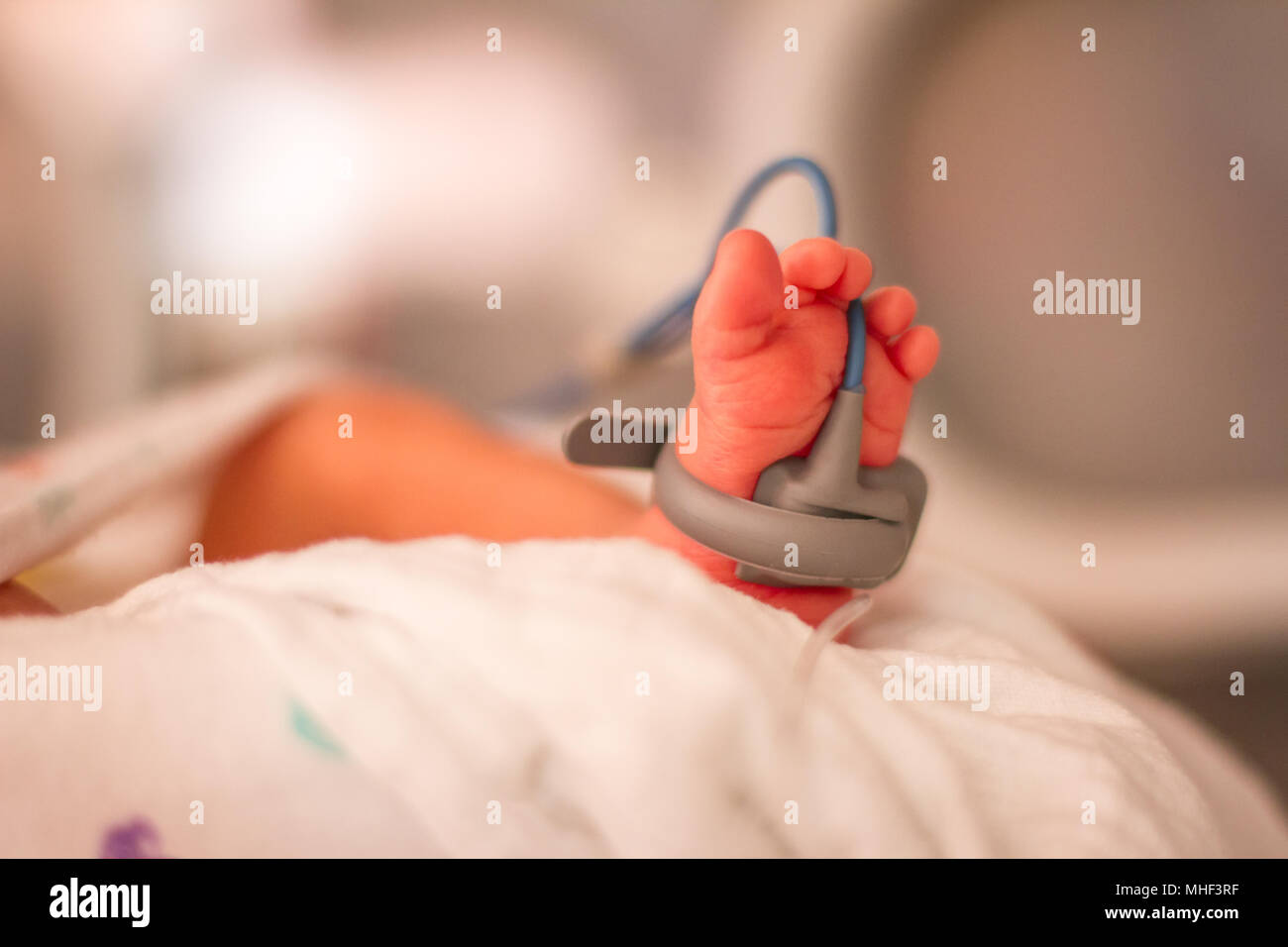 Newborn child in the intensive care unit ICU in a hospital Stock Photo