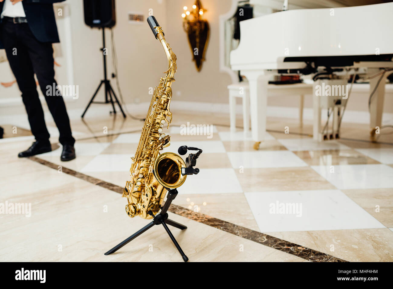 Golden saxophone on the stage close up Stock Photo Alamy