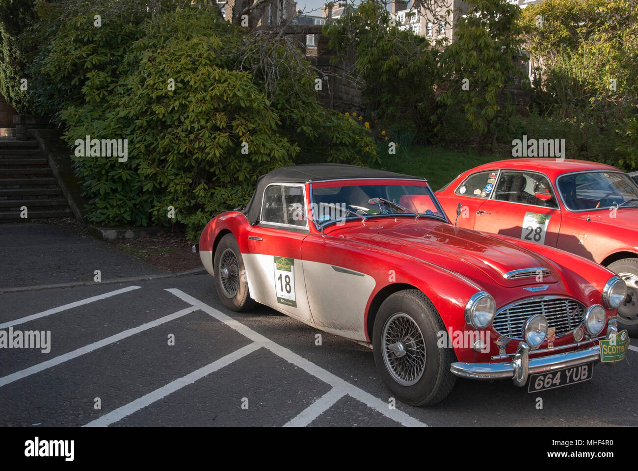 Red & White  Austin Healy 3000 100/6 Sports Car front right hand drivers side offside view of red and white right hand drive two door british converti Stock Photo