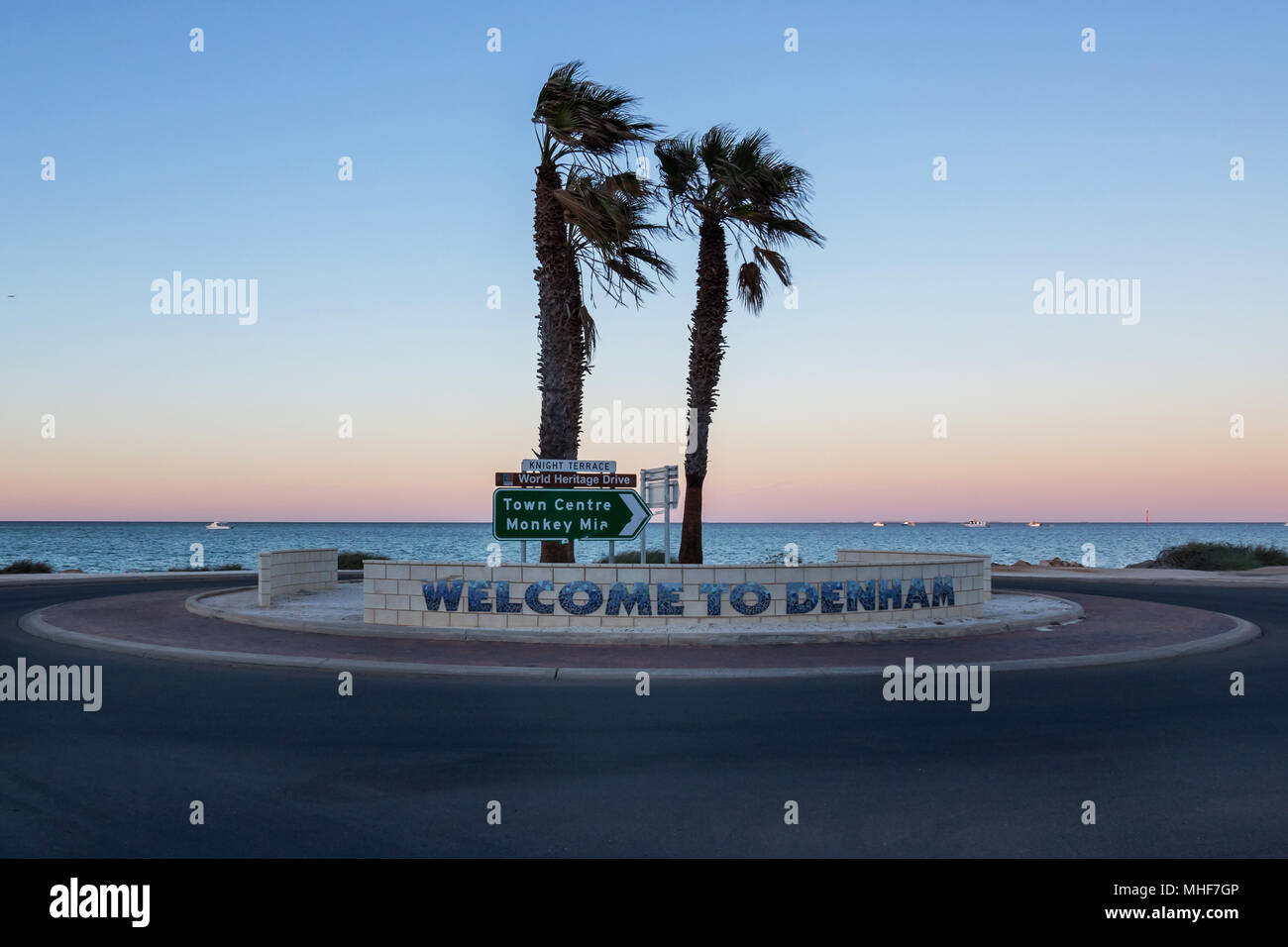 Roundabout in the entrance of Australian city of Denham during the sunrise,  in Western Australia Stock Photo - Alamy