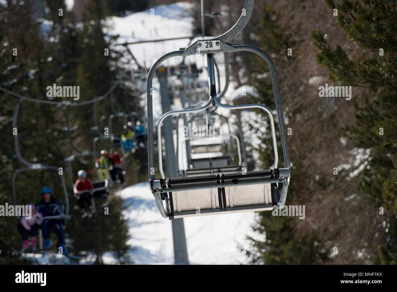 Chair Lift for skiers in winter snow time Stock Photo - Alamy