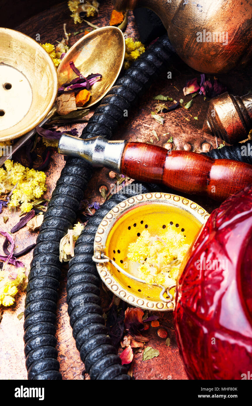 Smoke hookah with herbal floral tea.Shisha concept.Hookah concept Stock
