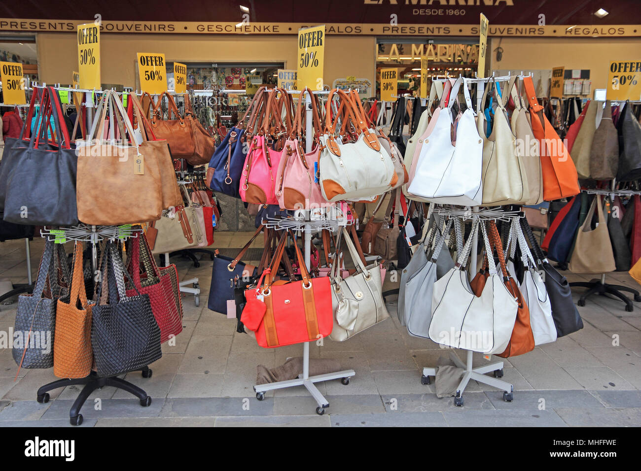 Mediabakery - Photo by Age Fotostock - Florida, Orlando, Premium Outlets,  shopping, Tory Burch, designer, display, sale, women´s, handbags, woman,  inside.